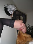 Masked bitch in black stockings gets her pussy licked by dog - picture 10