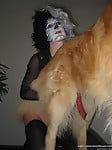 Masked bitch in black stockings gets her pussy licked by dog - picture 27