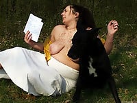 Zoo slut with saggy tits fucks outdoor with a black dog - picture 20