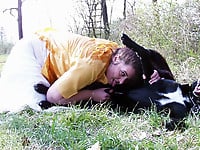Zoo slut with saggy tits fucks outdoor with a black dog - picture 23