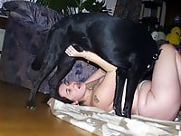 Zoo slut with saggy tits fucks outdoor with a black dog - picture 28