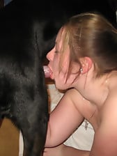 Big-boobed chick with round ass bangs with a trained dog