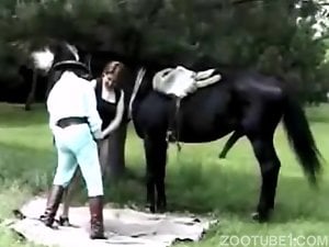 Black horse impaled a slutty big-boobed redhead