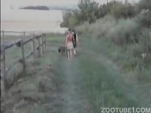 Busty-boobed dog lover banged by her pet in the missionary pose