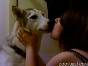 Sexy trained doggy and a hot wife kiss each other
