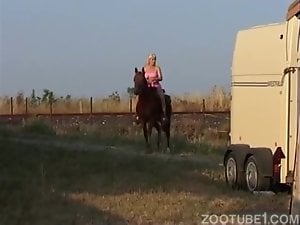 Horse with monster cock fills blonde with sperm