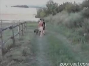 Busty babe and her lovely brown dog in amateur bestiality