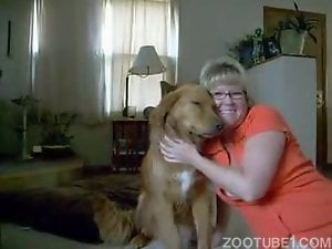 Sexy mature licks the dog's pussy