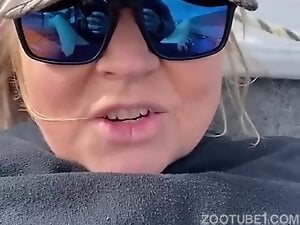 Fat old blonde fucking her pussy with a fish outside
