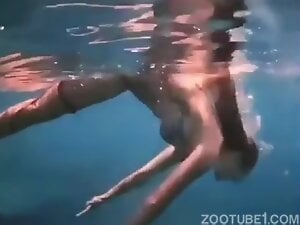 Babe swimming underwater to let octopus fuck her puss