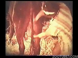 Vintage farm bestiality sex with a big-boobed milkmaid